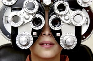 kid receiving eye exam 